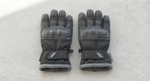 Both left and right waterproof winter work gloves laid flat to showcase their overall design and color scheme.